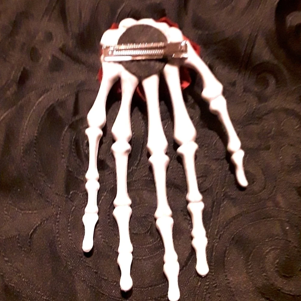 Skeleton hand rose hair clip